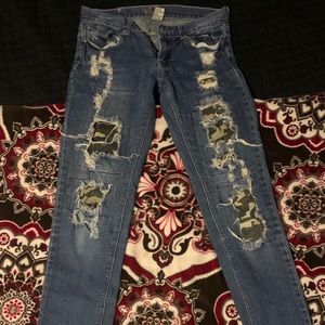 Red Rivet skinny jeans with camo underneath